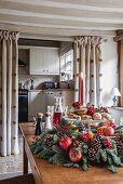 Luxuriant Christmas wreath on wooden table