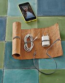 A DIY roll-up cable bag made of leather paper