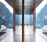 Reflections from hallways and balcony of modern architect-designed house