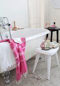 White free-standing bathtub in vintage interior