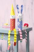 Easter bunny and clown made from eggs, toilet roll tubes and paper concertinas