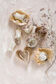 Vintage Christmas-tree decorations and paper hearts