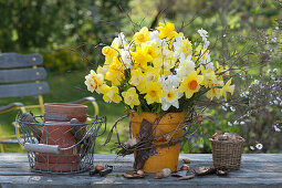 Narcissus bouquet decorated with twigs and bark