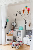 White wall decorated with black washi tape in boy's bedroom