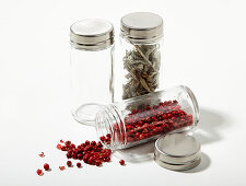 Spices in screw-top jars with metal lids