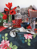 Table festively set for Christmas in red and black