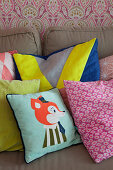 Various scatter cushions on sofa