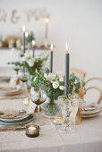 Table festively set for wedding in natural shades
