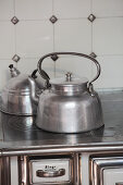 Kettle on hob of traditional wood-fired cooker