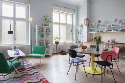 Colourful retro furniture in open-plan period interior