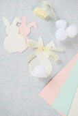 Paper Easter bunnies with lace ribbons