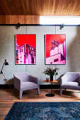 Two photos in pink and red over two designer armchairs
