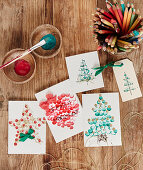 Handmade Christmas cards painted with fingerprints