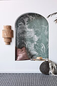 Sitting alcove with arch and green jungle motif wallpaper