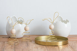 Easter bunnies made from golden wire and wooden beads