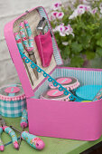 Handmade, feminine tool box in shades of pink and pale blue