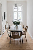 Various chairs in minimalist dining room