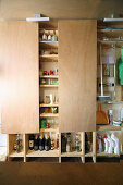 Groceries on shelves with sliding plywood doors