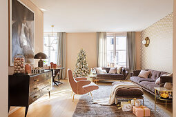 Elegant living room decorated in pink, gold and mauve at Christmas