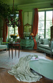 Antique furniture in green French parlour