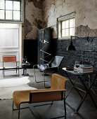 Industrial-style living room: various chairs, console table and locker