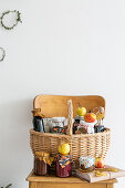 Basket of preserving jars and apples