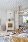 A view of a fireplace in a Scandinavian-style living room