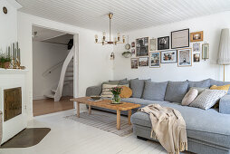 Gray upholstered sofa and coffee table in a Scandinavian living room