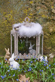 Easter bunnies and alpine squill, Easter bunnies and grape hyacinths in the glass shrine