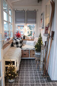 Benches and wintry decorations in porch
