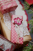 Christmas packaging in red and gold and with doilies