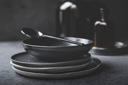 Black plates and bowls