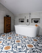Wooden drawers modern bath and dramatic Majolica floor tiles