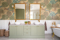 Two mirrors in the classic bathroom with a double sink vanity in pale green