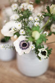 Small bouquet with white anemones in ceramic vase