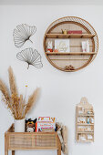 Various shelves made of natural materials in child's bedroom