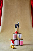 DIY circus - gorilla figure on tower made of tin cans