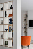 Living room detail - room divider with a built in shelving unit