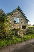 Converted former dairy barn in natural stone