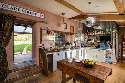 Open kitchen with rustic butcher's block