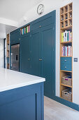 Blue built-in kitchen cabinets