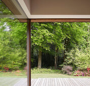 Sliding door, reflection and view into the garden
