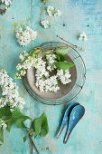 Wreath of lilac blossoms in a wooden bowl
