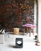 Seating area with volcanic rock wall