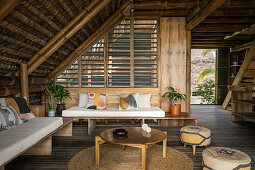 Ground floor living area with bamboo construction and thatched roof, Casa Toquilla, Ecuador