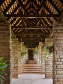 Covered walkway made of wood and stone, The Sorsbie Residence, Nairobi