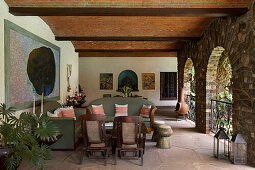 Covered seating area with brick vaults and stone arcades