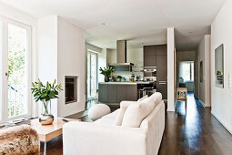 Modern living area with fireplace and kitchen, Hamburg, Germany