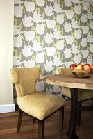 Table and Chair; Bowl of Peaches; Wallpapered Wall