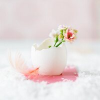 Easter arrangement of spring flowers in egg shell
